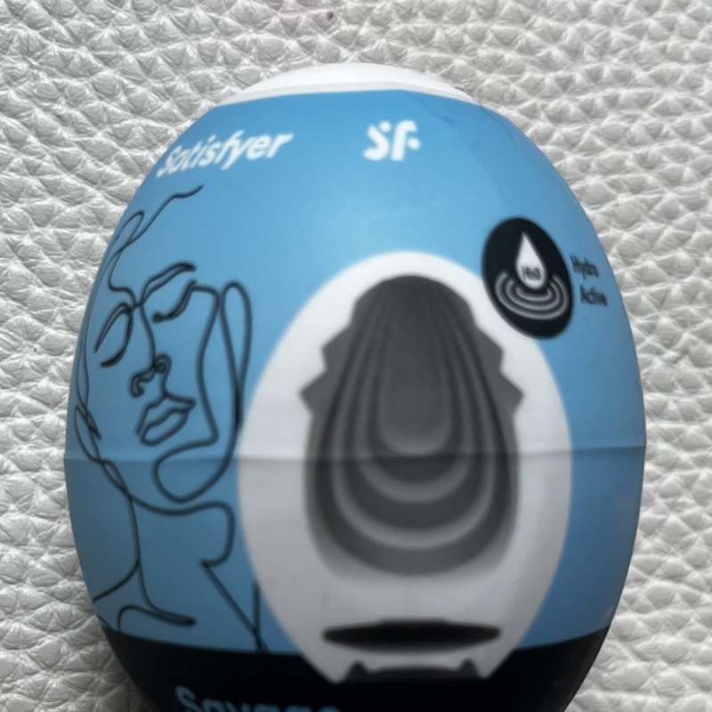 KUVA 1: Uusi Satisfyer Savage Masturbator Egg masturbaatiomuna.
Materiaali Hydro-Active TPE, ABS.
Kertakäyttöinen.